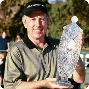Hale Irwin holding the Hoag Classic trophy